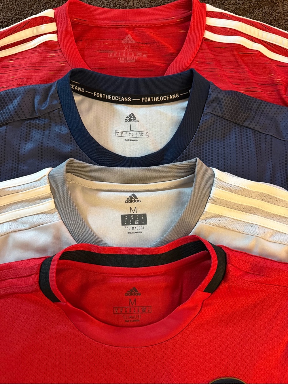 Man United Men's Red, Navy, and grey kits - Set of 4